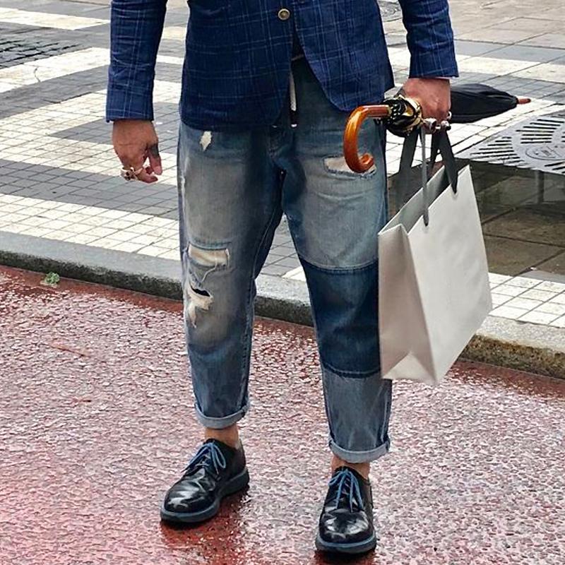 Męskie vintage dżinsy z przetarciami i łatami 00359354Y